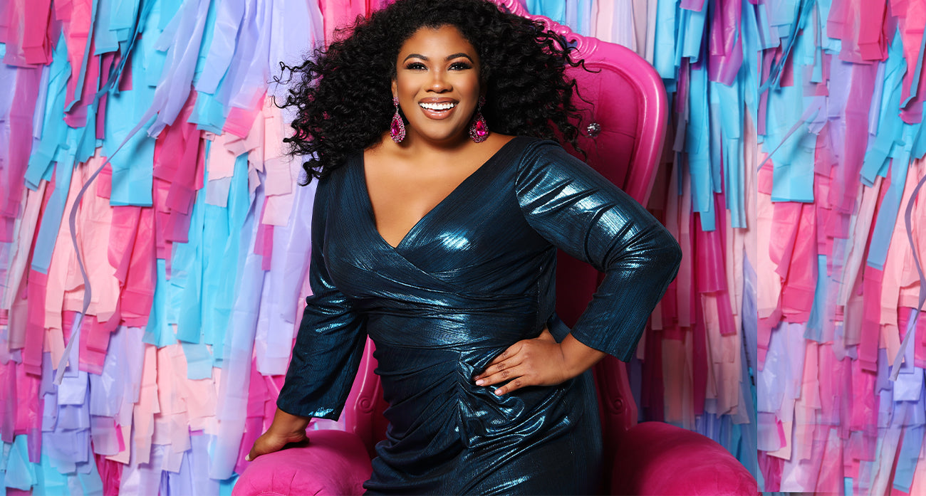 Sydney's Closet cheap plus size prom and formal dress shopping tips. Model Morgan Holmes wearing CE2015 in teal sitting on a pink throne.