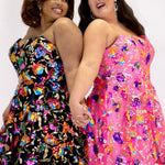 JK2501 duo picture of bubblegum pink and onyx black short party dress.  Strapless, sweetheart neckline, basque waistline, pockets and flowy A-line skirt.  Unique bright colored sequin floral fabric.  Long invisible center back zipper.  Johnathan Kayne for Sydney's Closet