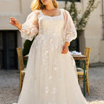 Michelle Bridal MB2308 Ivory. Soft bridal tulle, 3D floral lace appliques, A-line silhouette, Scoop neckline,  Detachable pouf sleeve with lace and zipper on cuff included, Scoop back, Long invisible center back zipper, Full A-line skirt with 3D lace appliques on front and back.