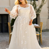 Michelle Bridal MB2308 Ivory. Soft bridal tulle, 3D floral lace appliques, A-line silhouette, Scoop neckline,  Detachable pouf sleeve with lace and zipper on cuff included, Scoop back, Long invisible center back zipper, Full A-line skirt with 3D lace appliques on front and back.