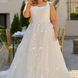 Michelle Bridal MB2308 Ivory. Soft bridal tulle, 3D floral lace appliques, A-line silhouette, Scoop neckline, Detachable pouf sleeve with lace and zipper on cuff included, Scoop back, Long invisible center back zipper, Full A-line skirt with 3D lace appliques on front and back.