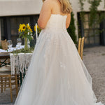 Michelle Bridal MB2425 Ivory. Modern leaf appliques Soft bridal tulle, sparkle tulle, soft tulle, light satin Crinoline = 2 layers, Satin layer, Clear & opaque sequins, pearls, bugle beads, cut glass, Strapless bodice, Optional 1 inch straps covered in lace appliques, Sweetheart neckline, Modified Basque waist.