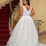 Michelle Bridal MB2429 Ivory. Bridal tulle, bridal tulle, Satin lining, Appliques = Embroidered lace appliques, Guipure Lace trim, Silhouette: A-line, V-neckline, Ivory mesh insert Detachable, Puff Sleeve = long sleeve with cuff, Front bodice is lined, Back bodice has optional lining with snaps, Natural waistline.