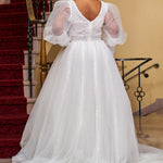 Michelle Bridal MB2429 Ivory. Bridal tulle, bridal tulle, Satin lining, Appliques = Embroidered lace appliques, Guipure Lace trim, Silhouette: A-line, V-neckline, Ivory mesh insert Detachable, Puff Sleeve = long sleeve with cuff, Front bodice is lined, Back bodice has optional lining with snaps, Natural waistline.