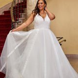 Michelle Bridal MB2429 Ivory. Bridal tulle, bridal tulle, Satin lining, Appliques = Embroidered lace appliques, Guipure Lace trim, Silhouette: A-line, V-neckline, Ivory mesh insert Detachable, Puff Sleeve = long sleeve with cuff, Front bodice is lined, Back bodice has optional lining with snaps, Natural waistline.