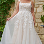 Michelle Bridal style MB2521 is available in ivory or ivory/champagne in plus sizes 14-40.  Square neckline, 1 inch illusion straps covered in leaf lace applqiues. A-line skirt with long train and optional bodice lining included.
