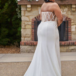 Sophisticated and sexy plus size simple crepe wedding dress with detachable puff sleeves.  Plain crepe slim front with sweetheart neckline and natural waist.  Optional lining included for the back bodice with criss-cross exposed boning.  Michelle Bridal by Sydney's Closet style MB2522