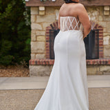 Sophisticated and sexy plus size simple crepe wedding dress with detachable puff sleeves.  Plain crepe slim front with sweetheart neckline and natural waist.  Optional lining included for the back bodice with criss-cross exposed boning.  Michelle Bridal by Sydney's Closet style MB2522