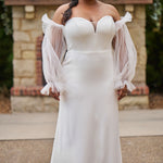 Sophisticated and sexy plus size simple crepe wedding dress with detachable puff sleeves.  Plain crepe slim front with sweetheart neckline and natural waist.  Optional lining included for the back bodice with criss-cross exposed boning.  Michelle Bridal by Sydney's Closet style MB2522
