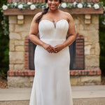 Sophisticated and sexy plus size simple crepe wedding dress with detachable puff sleeves.  Plain crepe slim front with sweetheart neckline and natural waist.  Optional lining included for the back bodice with criss-cross exposed boning.  Michelle Bridal by Sydney's Closet style MB2522