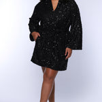 Our plus size sequin robe is a stunning, comfortable piece designed for confident, curvy women looking for comfort as they get ready on their special day. Made from stretch sequin with a light stretch knit lining, this robe is the perfect getting ready outfit  Roomy sleeves and an adjustable tie belt make for the perfect fit and pockets to hold your essentials! Style SC1009 by Sydney's Closet - Front view in onyx black