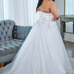 Sydney's Closet plus size wedding dress with lace up back and modesty panel.  V-neckline embelished with 3D floral appliques and silver stones.  Full A-line skirt and long train. Style SC5345
