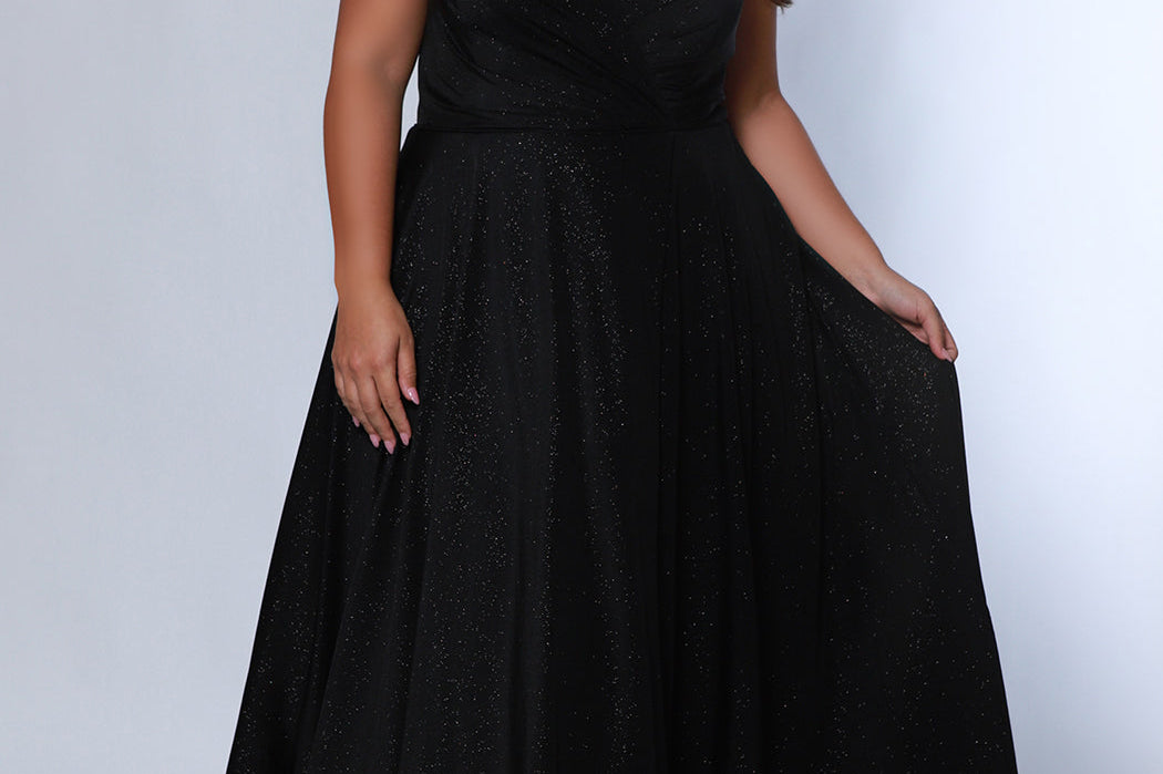 Sydney's Closet SC7375 Black. Aline silhouette, Stretch jersey with sparkle over stretch knit lining, V-neckline, Spaghetti straps, Natural waistline, Aline skirt with pockets.
