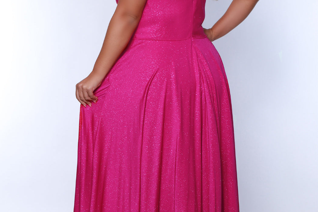 Sydney's Closet SC7375 Pink. Aline silhouette, Stretch jersey with sparkle over stretch knit lining, V-neckline, Spaghetti straps, Natural waistline, Aline skirt with pockets.