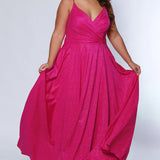 Sydney's Closet SC7375 Pink. Aline silhouette, Stretch jersey with sparkle over stretch knit lining, V-neckline, Spaghetti straps, Natural waistline, Aline skirt with pockets.