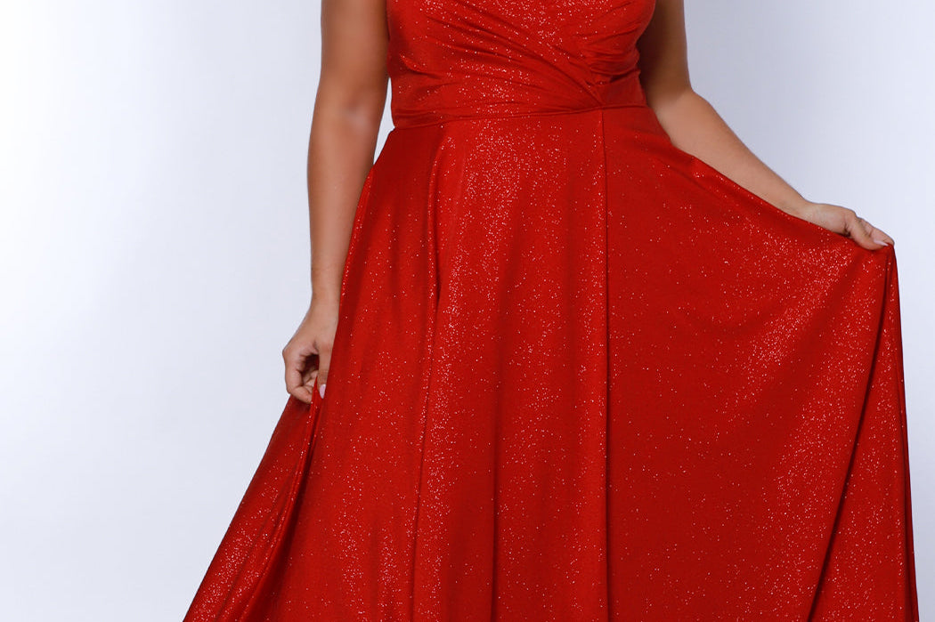 Sydney's Closet SC7375 Red. Aline silhouette, Stretch jersey with sparkle over stretch knit lining, V-neckline, Spaghetti straps, Natural waistline, Aline skirt with pockets.