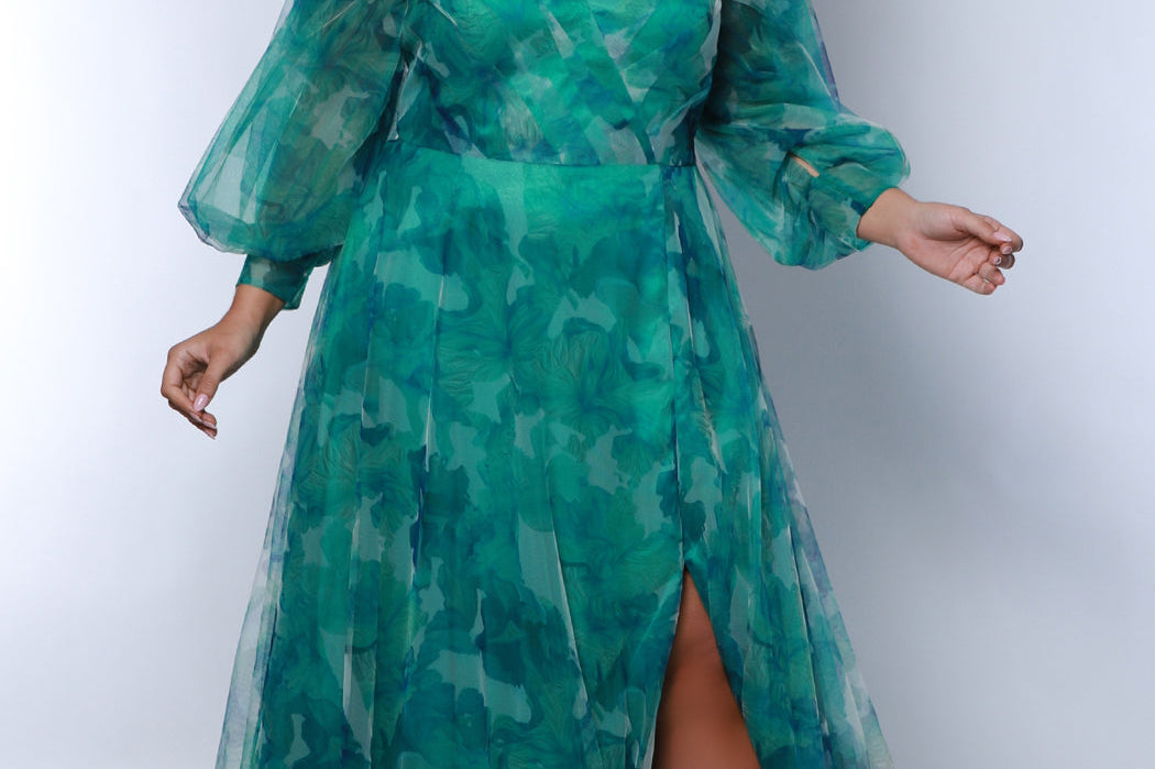 Sydney's Closet SC7386 Green. Floral print tulle, ruched bodice, sweetheart neckline, A-line skirt with slit, bicep to wrist puff sleeve, 4 inch cuff at wrist, center back zipper, natural waistline.