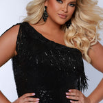 Sydney's Closet SC7391 Black. One shoulder, embroidered gold detail on slit and neckline, fringe off high point of shoulder, center back zipper.