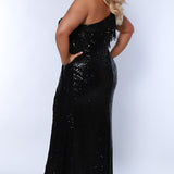 Sydney's Closet SC7391 Black. One shoulder, embroidered gold detail on slit and neckline, fringe off high point of shoulder, center back zipper.