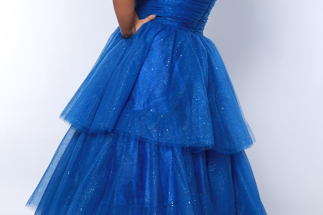 Sydney's Closet SC7392 Royal. Tiered glitter tulle ballgown, pleated bodice, rolled satin straps covered in glitter tulle, natural waistline, center back zipper.