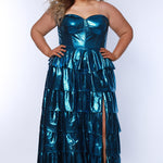 SC7405 by Sydney's Closet. Plus size strapless sweetheart metallic knit gown with exposed boning on bodice.  Tiered A-line skirt slit. Available in magenta pink, copper gold/brown and turq blue green.