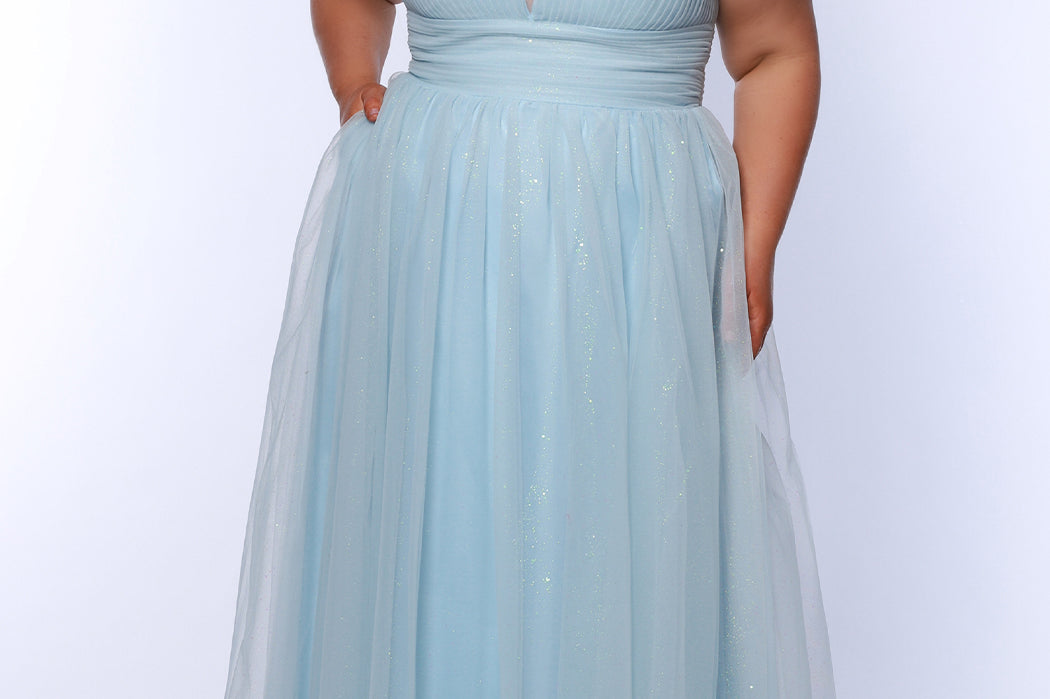 Plus Size princess A-line prom dress with bra-friendly straps, pleated bodice, pleated waistband and full A-line skirt with train. Detachable bows on shoulder. SC7417 in ice blue, mauve or sage green from Sydney's Closet.