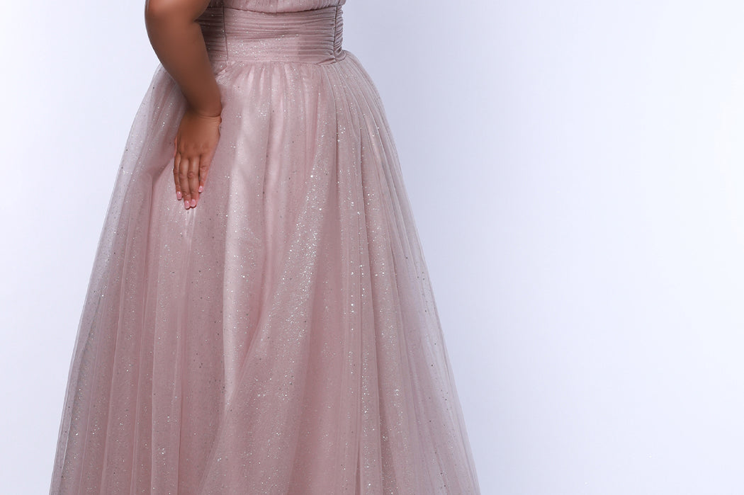 Plus Size princess A-line prom dress with bra-friendly straps, pleated bodice, pleated waistband and full A-line skirt with train. Detachable bows on shoulder. SC7417 in ice blue, mauve or sage green from Sydney's Closet.