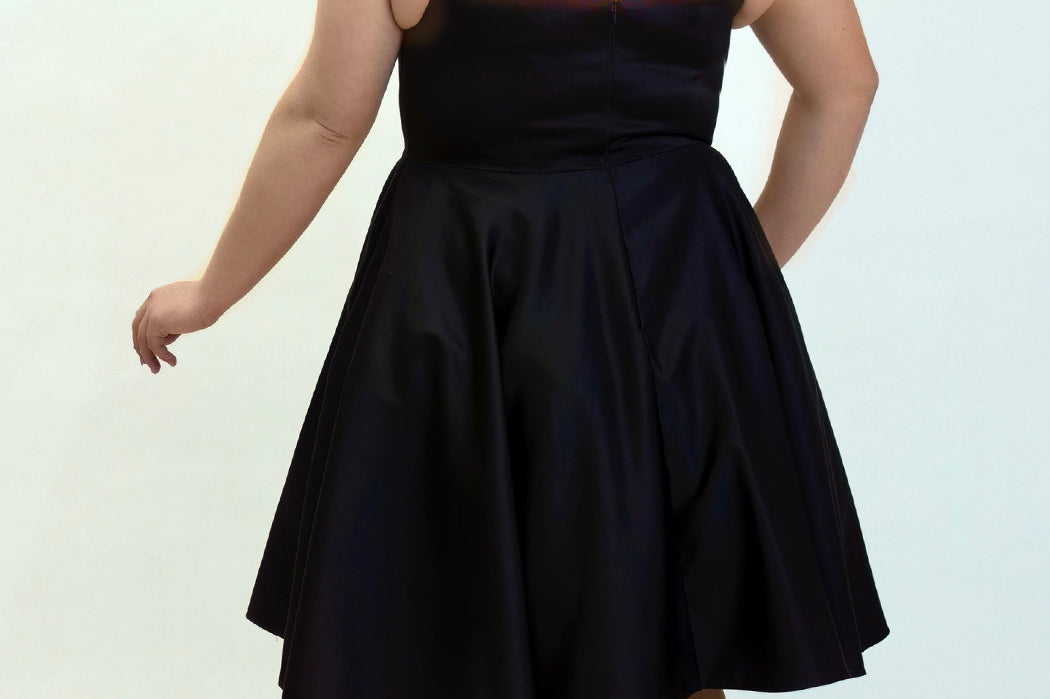 Sydney's Closet CE2401 Black. A-line silhouette, Scoop neckline polyester satin. Short party dress with pockets