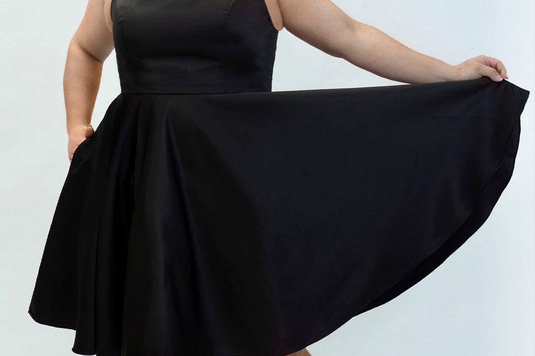 Sydney's Closet CE2401 Black. A-line silhouette, Scoop neckline polyester satin. Short party dress with pockets