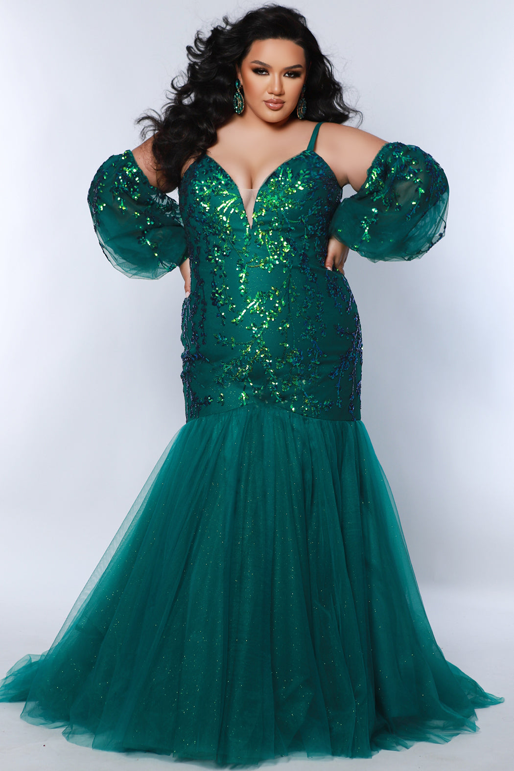 Tease Prom TE2439 Emerald. Mermaid silhouette, Iridescent leaf sequins with sparkle tulle, Deep V-neckline, Nude mesh insert, Spaghetti straps covered in sparkle tulle, Detachable puff sleeves covered in sequin, snaps on and off, Long invisible center back zipper, Mermaid skirt, Sweep train.