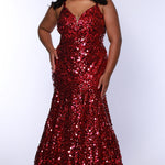 Fitted mermaid plus size prom dress.  Sequin and piette fabric with stretch knit linight. Deep v-neckline with nude mesh insert and spaghetti straps. Mermaid fitted skirt. Available in midnight navy blue and hot magenta pink. TE2512 by Tease Prom.