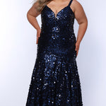 Fitted mermaid plus size prom dress.  Sequin and piette fabric with stretch knit linight. Deep v-neckline with nude mesh insert and spaghetti straps. Mermaid fitted skirt. Available in midnight navy blue and hot magenta pink. TE2512 by Tease Prom.