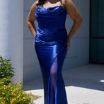 Sexy plus size fitted prom dress with double spaghetti straps, pleated bodice with optional bodice lining.  Exposed boning with hot fix stones on basque waistline.  Slim fitted skirt with ruching. High slit filled in with mesh and hot fix stones. Tease Prom style TE2516 avialable in berry, forest and navy.