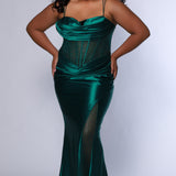 Sexy plus size fitted prom dress with double spaghetti straps, pleated bodice with optional bodice lining.  Exposed boning with hot fix stones on basque waistline.  Slim fitted skirt with ruching. High slit filled in with mesh and hot fix stones. Tease Prom style TE2516 avialable in berry, forest and navy.