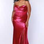 Sexy plus size fitted prom dress with double spaghetti straps, pleated bodice with optional bodice lining.  Exposed boning with hot fix stones on basque waistline.  Slim fitted skirt with ruching. High slit filled in with mesh and hot fix stones. Tease Prom style TE2516 avialable in berry, forest and navy.