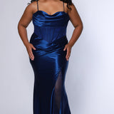 Sexy plus size fitted prom dress with double spaghetti straps, pleated bodice with optional bodice lining.  Exposed boning with hot fix stones on basque waistline.  Slim fitted skirt with ruching. High slit filled in with mesh and hot fix stones. Tease Prom style TE2516 avialable in berry, forest and navy.