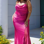Sexy plus size fitted prom dress with double spaghetti straps, pleated bodice with optional bodice lining.  Exposed boning with hot fix stones on basque waistline.  Slim fitted skirt with ruching. High slit filled in with mesh and hot fix stones. Tease Prom style TE2516 avialable in berry, forest and navy.