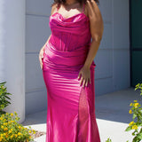 Sexy plus size fitted prom dress with double spaghetti straps, pleated bodice with optional bodice lining.  Exposed boning with hot fix stones on basque waistline.  Slim fitted skirt with ruching. High slit filled in with mesh and hot fix stones. Tease Prom style TE2516 avialable in berry, forest and navy.