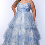 Best selling plus size floral tiered ballgown dress style TE2525 by Tease Prom.  Double spaghetti straps on pleated V-neckline bodice with tiered ball gown skirt in floral print tulle. Available in black floral or blue floral in sizes 14-32.
