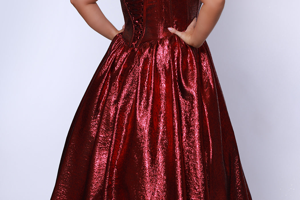 Tease Prom for Sydney's Closet style TE2539 available in ruby red or sapphire blue. Plus size ballgown with strapless sweetheart bodice, exposed boning, basque waist and full A-line skirt with pockets.