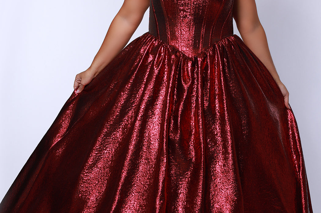 Tease Prom for Sydney's Closet style TE2539 available in ruby red or sapphire blue. Plus size ballgown with strapless sweetheart bodice, exposed boning, basque waist and full A-line skirt with pockets.
