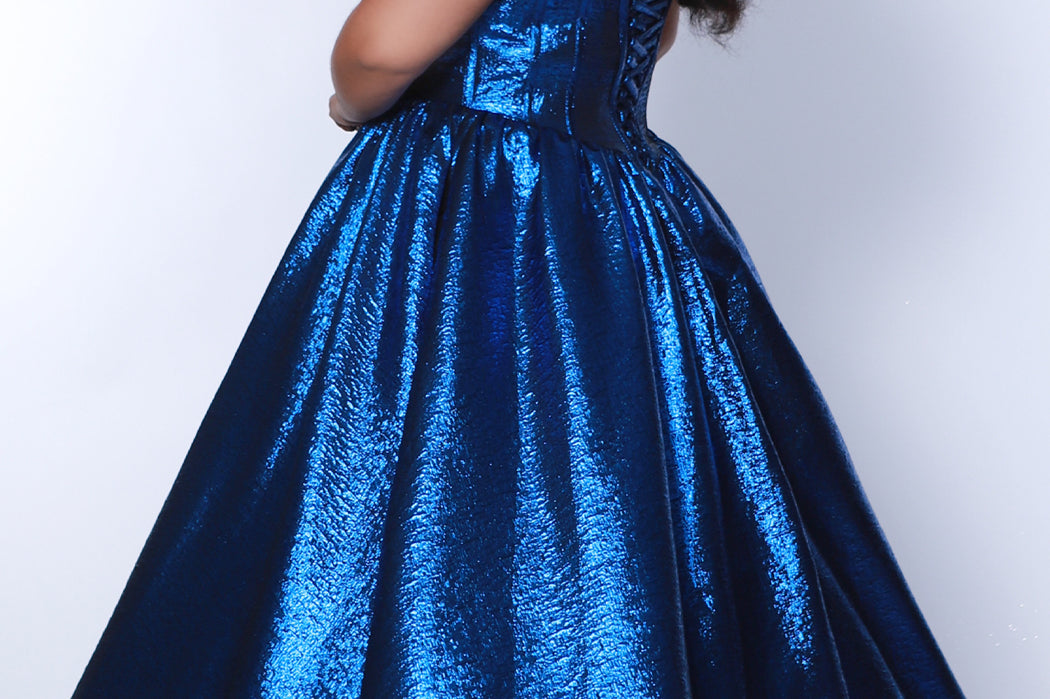 Tease Prom for Sydney's Closet style TE2539 available in ruby red or sapphire blue. Plus size ballgown with strapless sweetheart bodice, exposed boning, basque waist and full A-line skirt with pockets.
