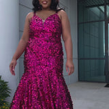 Fitted mermaid plus size prom dress.  Sequin and piette fabric with stretch knit linight. Deep v-neckline with nude mesh insert and spaghetti straps. Mermaid fitted skirt. Available in midnight navy blue and hot magenta pink. TE2512 by Tease Prom.