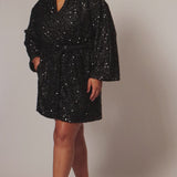 Our plus size sequin robe is a stunning, comfortable piece designed for confident, curvy women looking for comfort as they get ready on their special day. Made from stretch sequin with a light stretch knit lining, this robe is the perfect getting ready outfit  Roomy sleeves and an adjustable tie belt make for the perfect fit and pockets to hold your essentials! Style SC1009 by Sydney's Closet - Onyx Black Video on Set