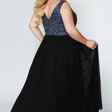 CE1813  has a V-neckline with illusion mesh net is heavily beaded and sequined on front and back. The dress is fully lined, with an A-line chiffon skirt. It's sleeveless, with bra-friendly straps