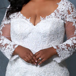 Michelle Bridal MB2202 Up close shot of bodice Plus Size ivory v-neck mermaid wedding dress with lace details on body and sleeves