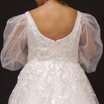 Michelle Bridal MB2308 Ivory. Soft bridal tulle, 3D floral lace appliques, A-line silhouette, Scoop neckline, Detachable pouf sleeve with lace and zipper on cuff included, Scoop back, Long invisible center back zipper, Full A-line skirt with 3D lace appliques on front and back.
