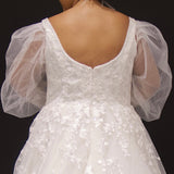 Michelle Bridal MB2308 Ivory. Soft bridal tulle, 3D floral lace appliques, A-line silhouette, Scoop neckline, Detachable pouf sleeve with lace and zipper on cuff included, Scoop back, Long invisible center back zipper, Full A-line skirt with 3D lace appliques on front and back.