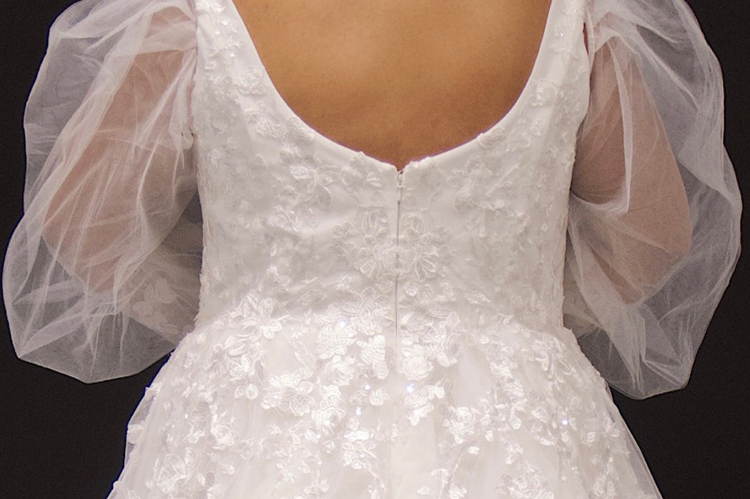 Michelle Bridal MB2308 Ivory. Soft bridal tulle, 3D floral lace appliques, A-line silhouette, Scoop neckline, Detachable pouf sleeve with lace and zipper on cuff included, Scoop back, Long invisible center back zipper, Full A-line skirt with 3D lace appliques on front and back.