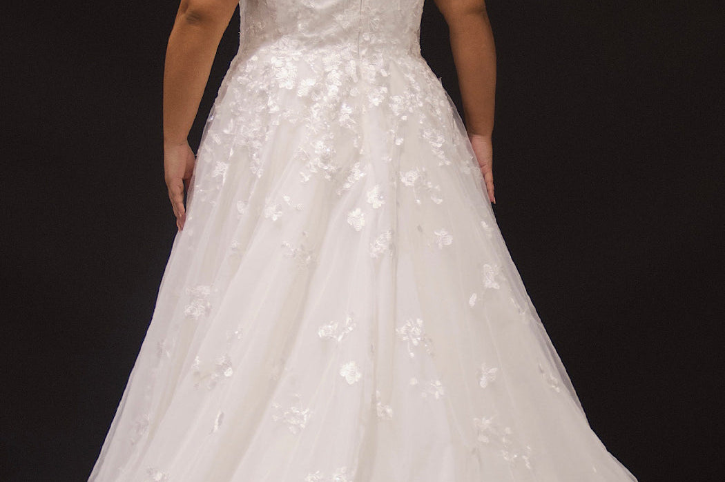 Michelle Bridal MB2308 Ivory. Soft bridal tulle, 3D floral lace appliques, A-line silhouette, Scoop neckline, Detachable pouf sleeve with lace and zipper on cuff included, Scoop back, Long invisible center back zipper, Full A-line skirt with 3D lace appliques on front and back.